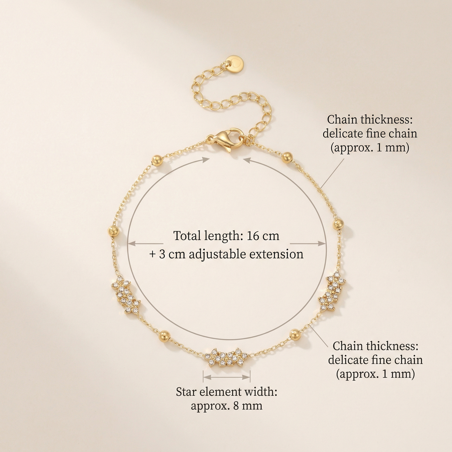 Gold Vela bracelet with measurements on a beige background