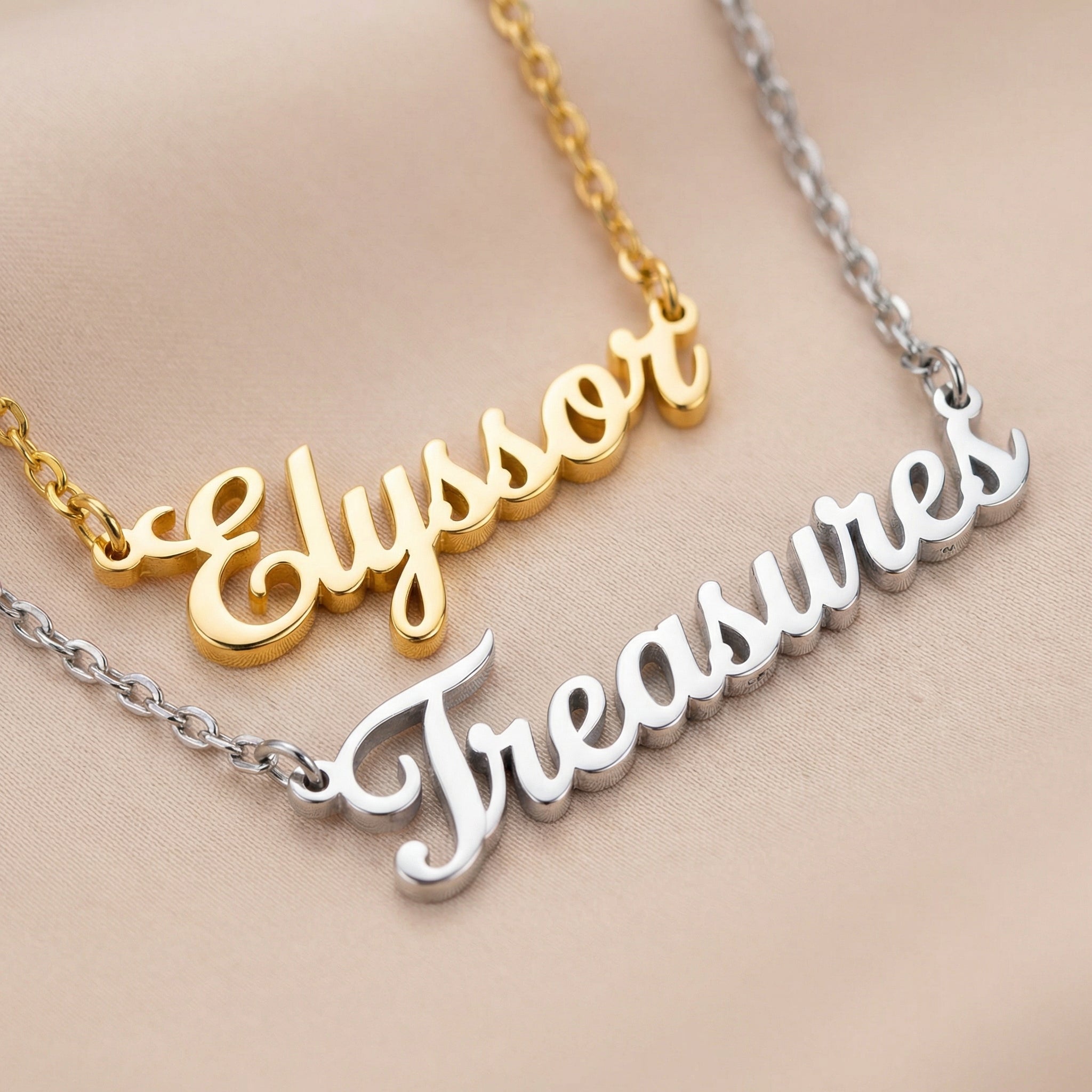 Gold and silver necklaces with 'Elyssor' and 'Treasures' text on a beige background