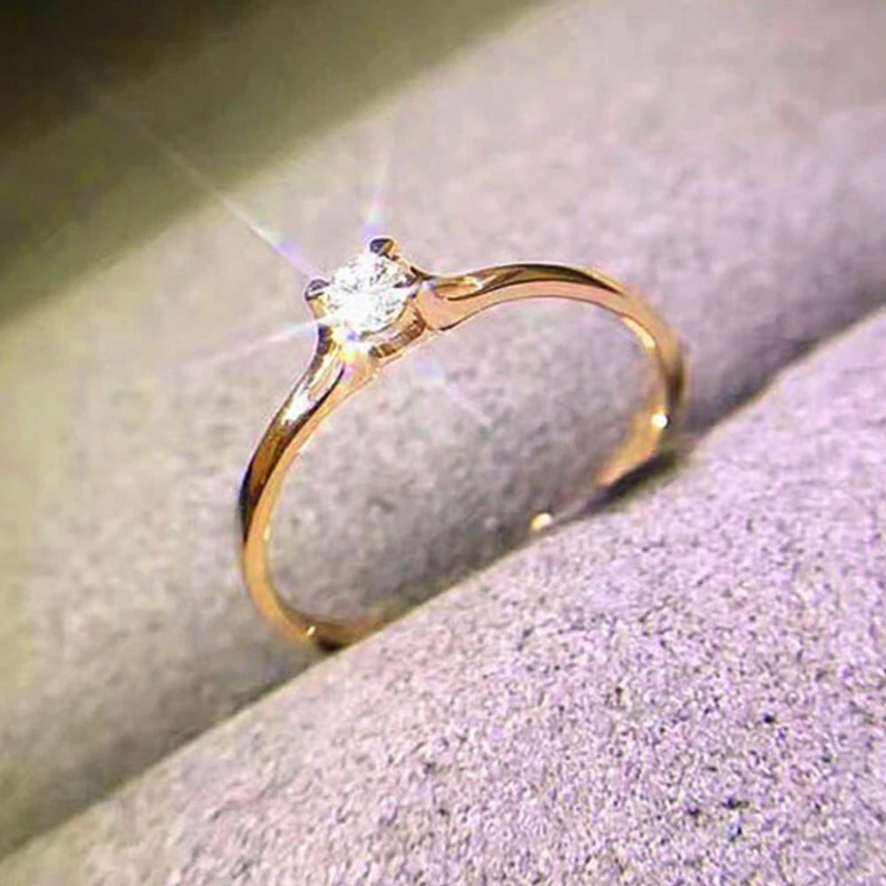 Minimalist 4mm Cubic Zirconia Solitaire Ring