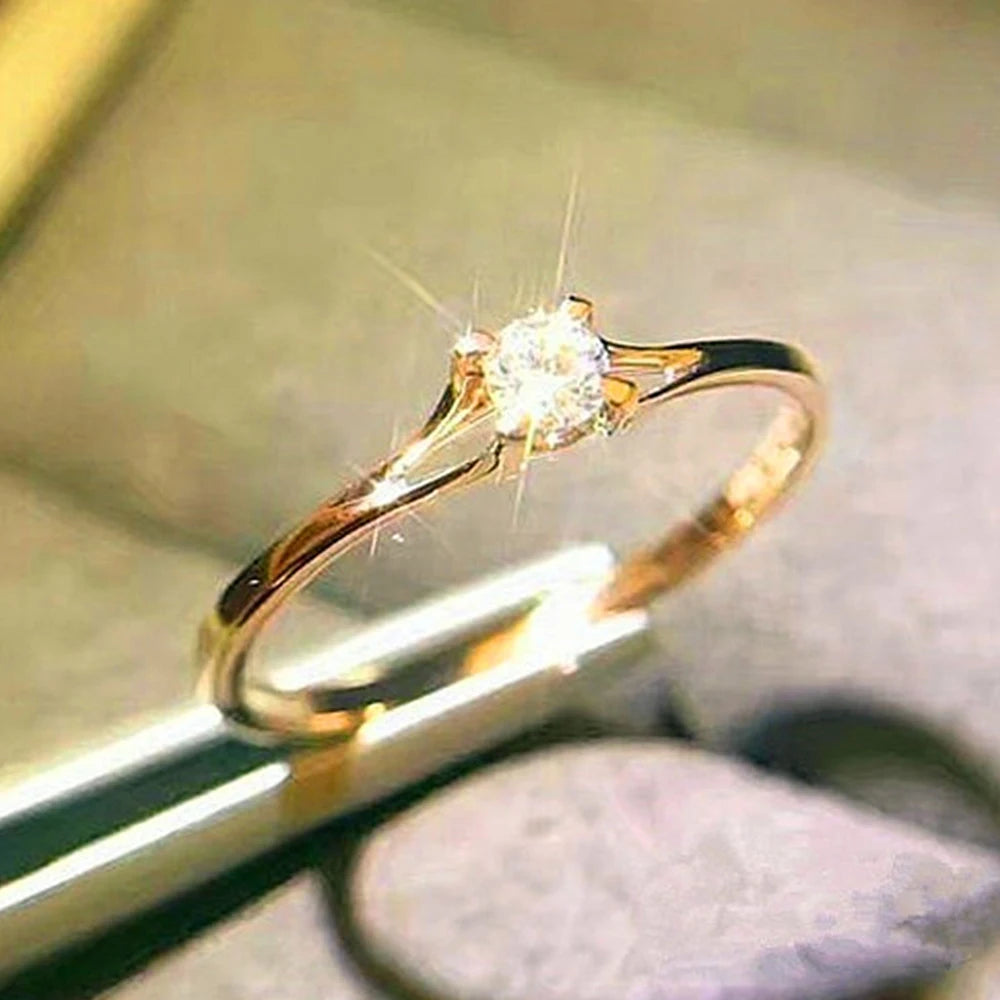 Minimalist 4mm Cubic Zirconia Solitaire Ring