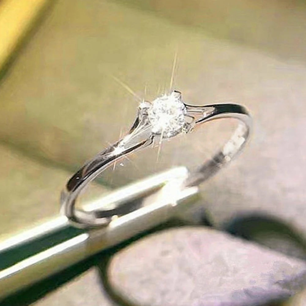 Minimalist 4mm Cubic Zirconia Solitaire Ring