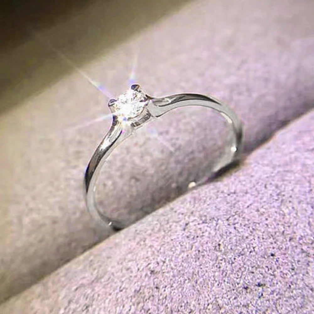 Minimalist 4mm Cubic Zirconia Solitaire Ring