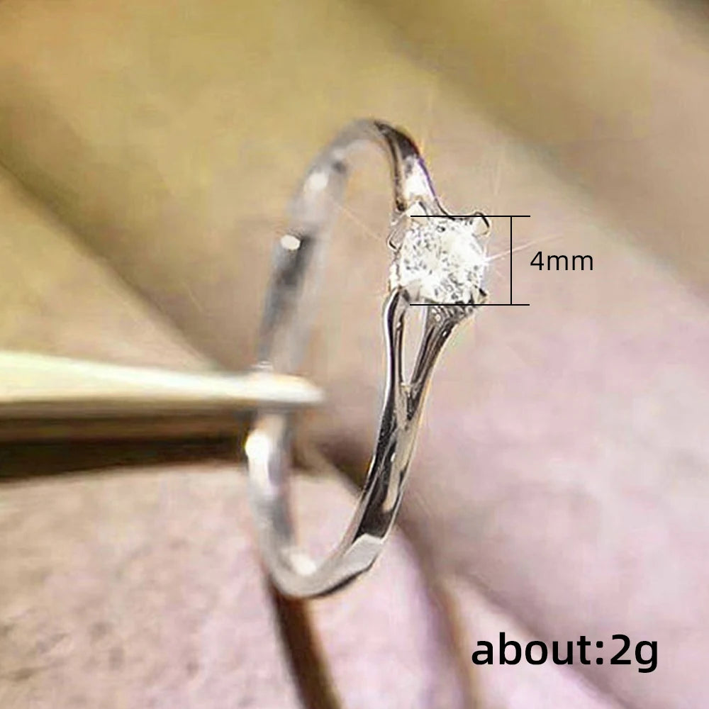 Minimalist 4mm Cubic Zirconia Solitaire Ring