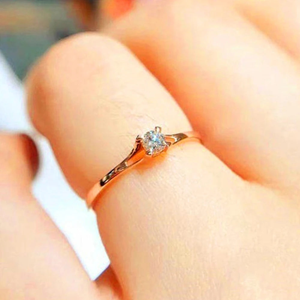Minimalist 4mm Cubic Zirconia Solitaire Ring