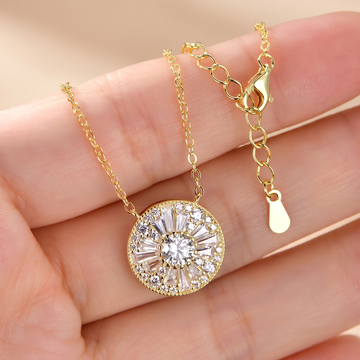 14k gold-filled D-color moissanite solitaire necklace on a soft beige background