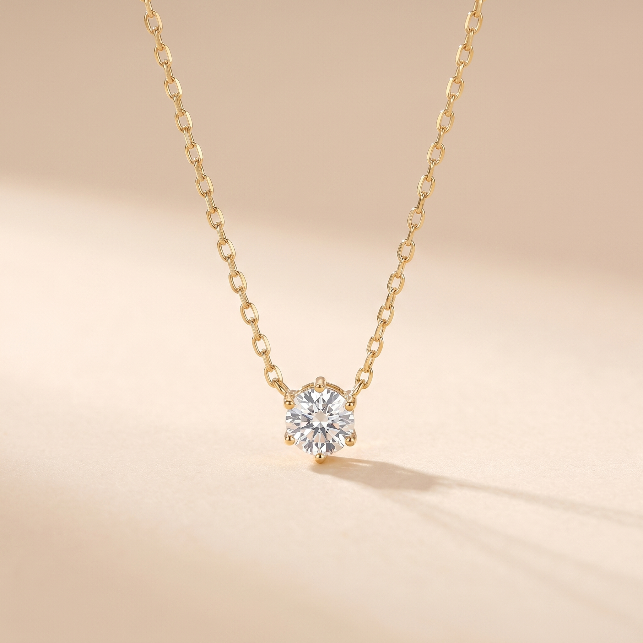 Sterling silver zircon solitaire pendant necklace on a soft beige background
