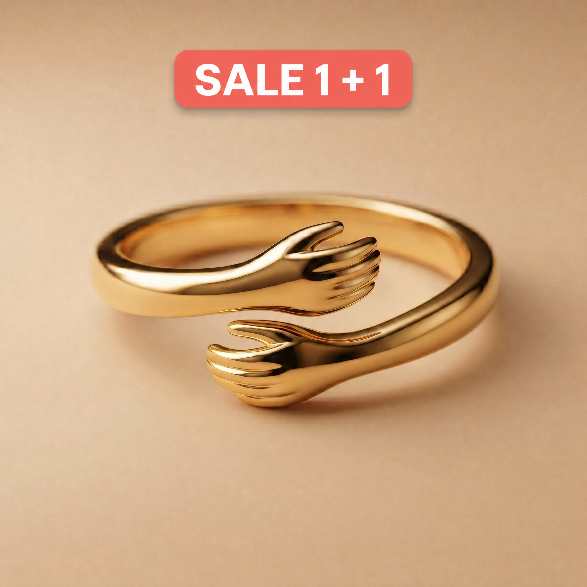 Gold hug ring on a soft beige background with Sale 1+1 badge