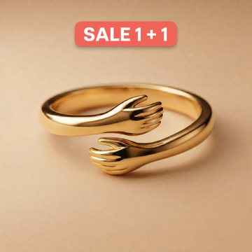 Gold hug ring on a soft beige background with Sale 1+1 badge