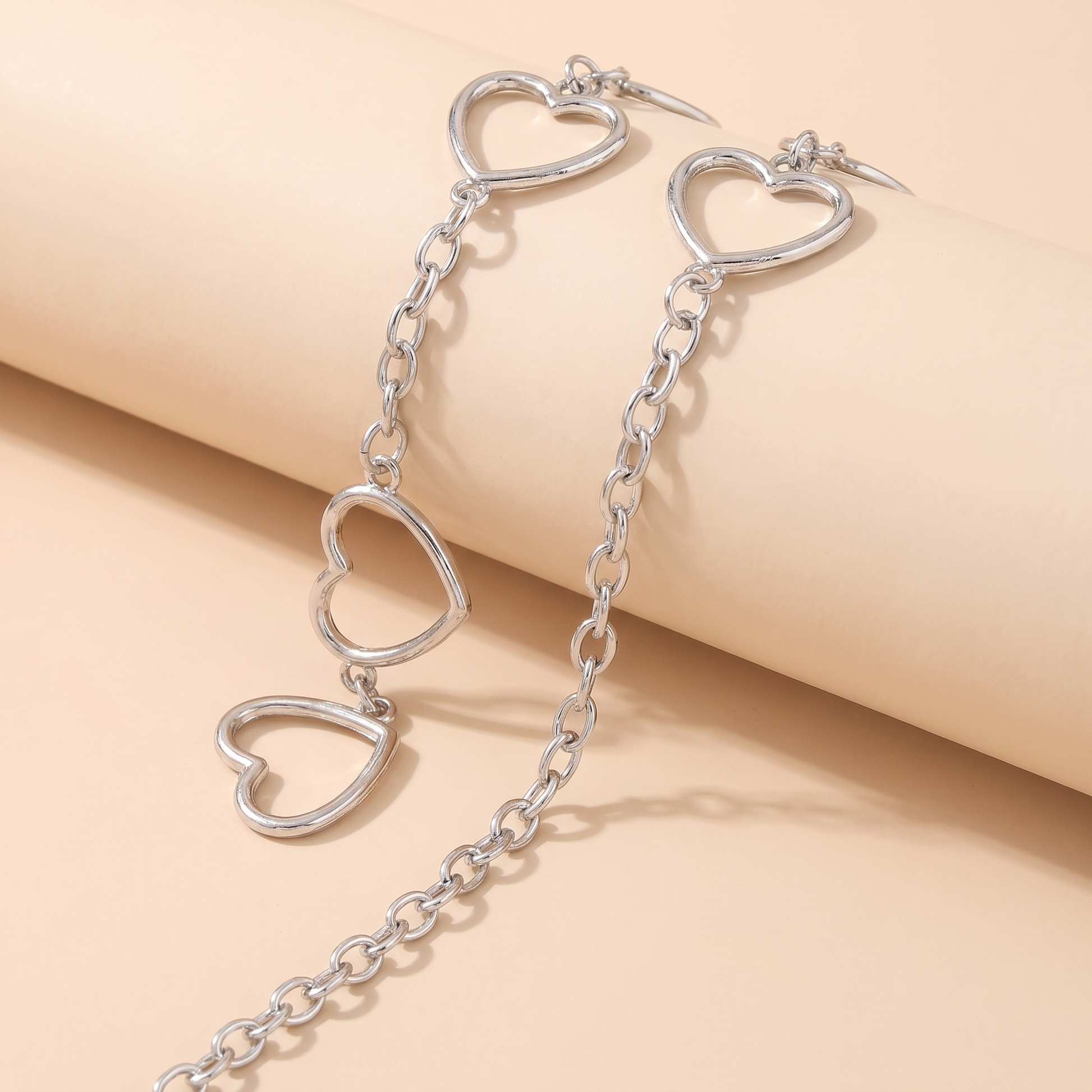 Macro detail of the crystal fringe belt on beige