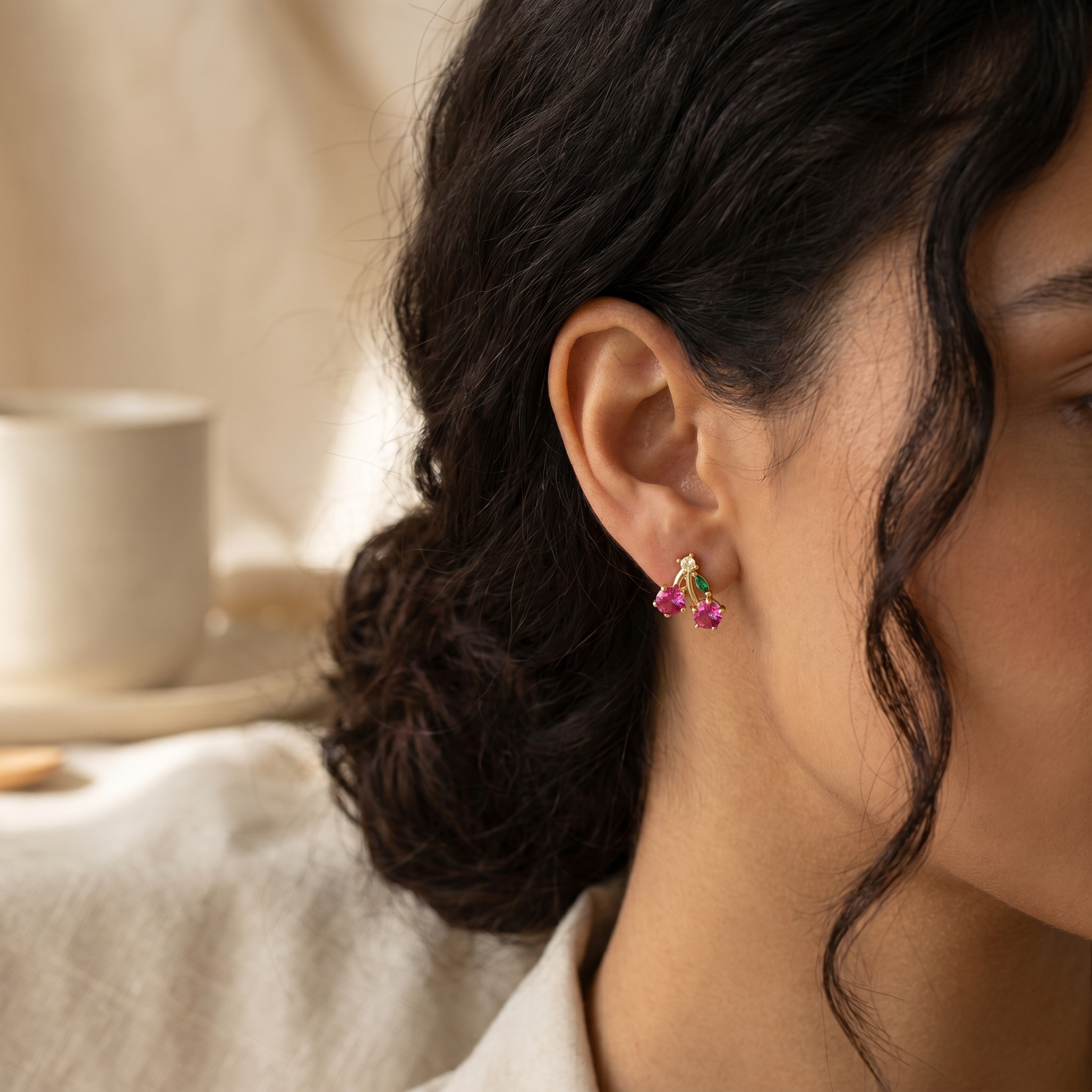 Cherry Sparkle Stud Earrings worn on ear