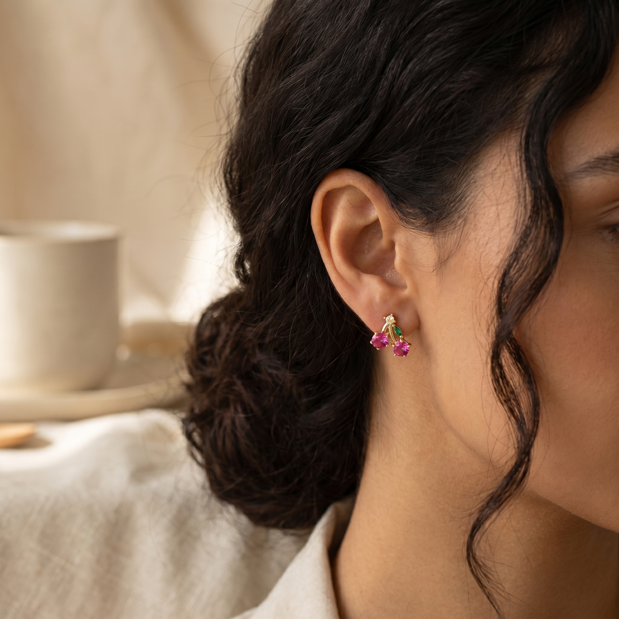 Cherry Sparkle Stud Earrings worn on ear