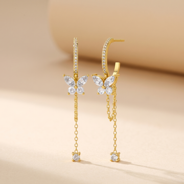 Butterfly Chain Drop Stud Earrings on soft beige background