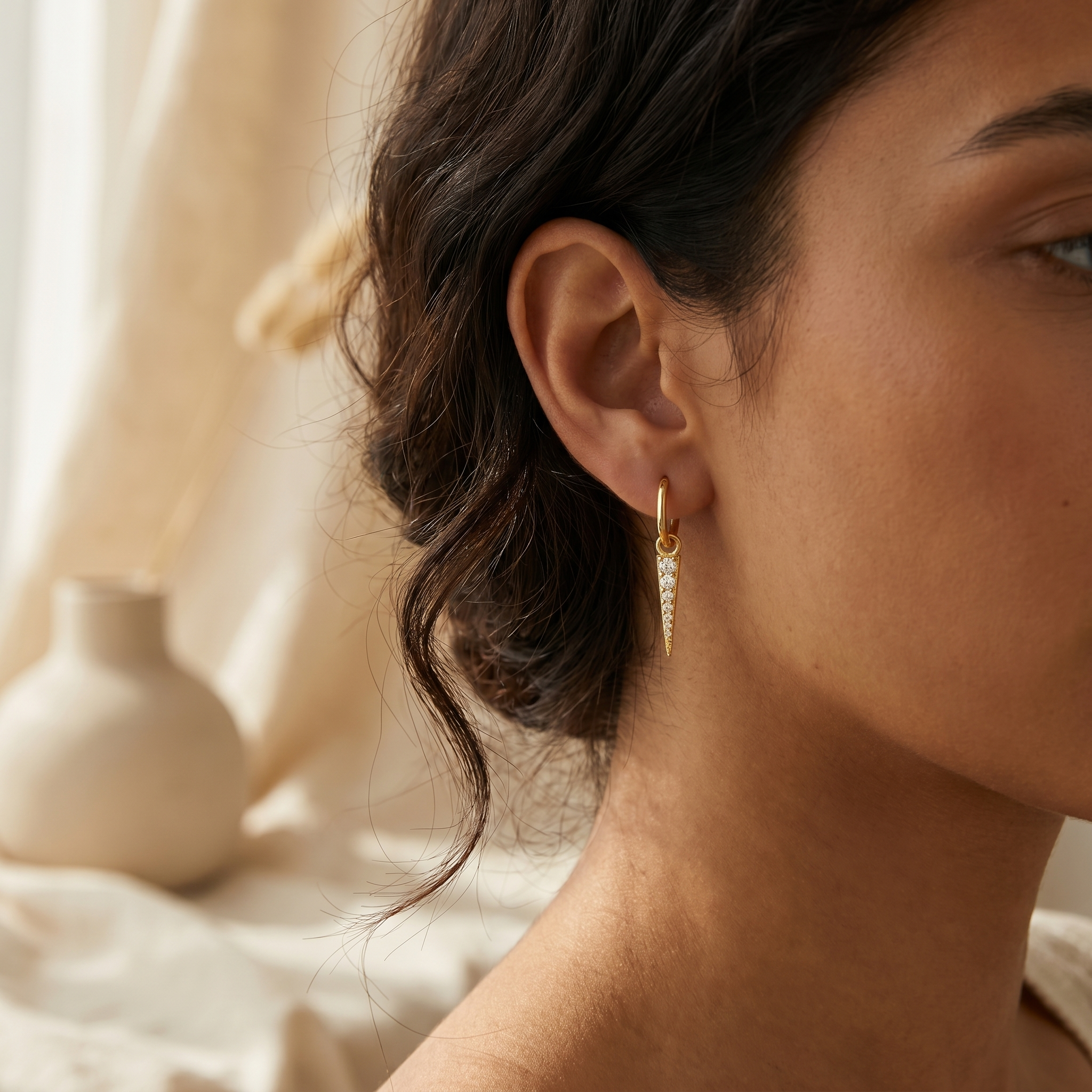 Pave Spike Dagger Huggie Earrings worn on ear